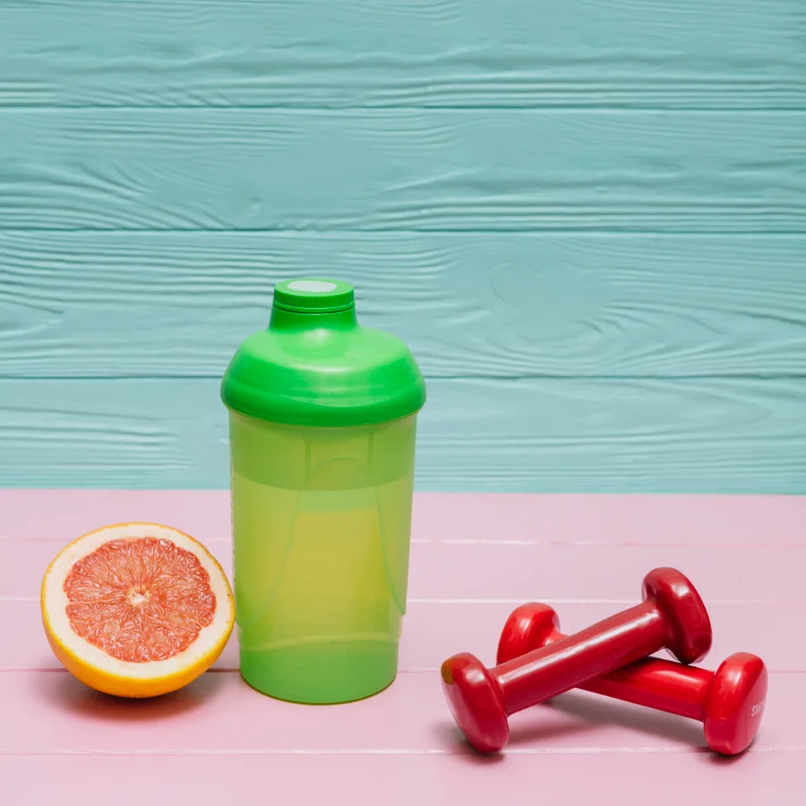 Fitness kit laid out flat, softened behind the headline figure